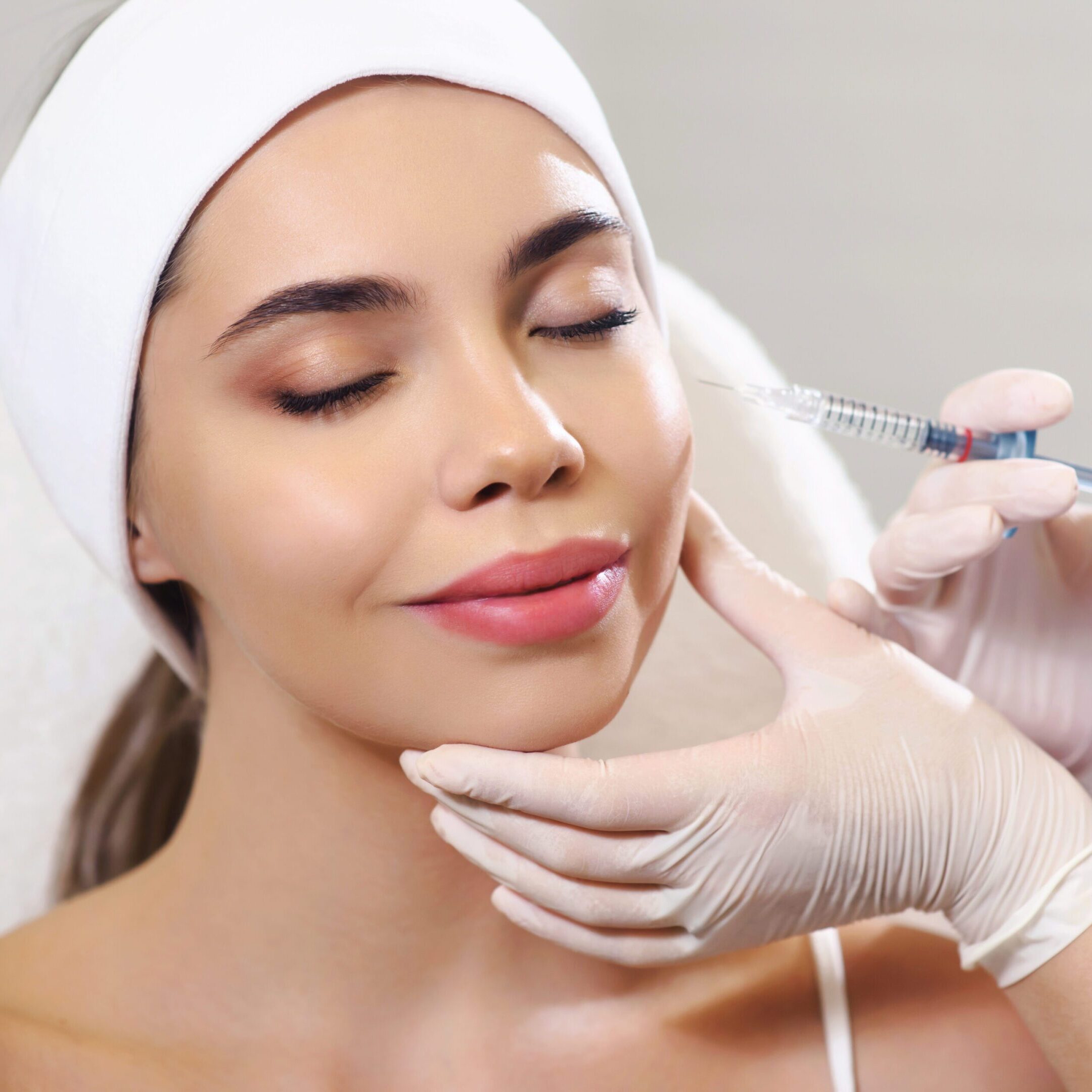 Beautician doctor cosmetologist at work. Biorevitalization cosmetology injection. Face skin treatment hyaluronic acid. Beauty facial filling. Filler. Botox procedure. Healthcare beauty concept