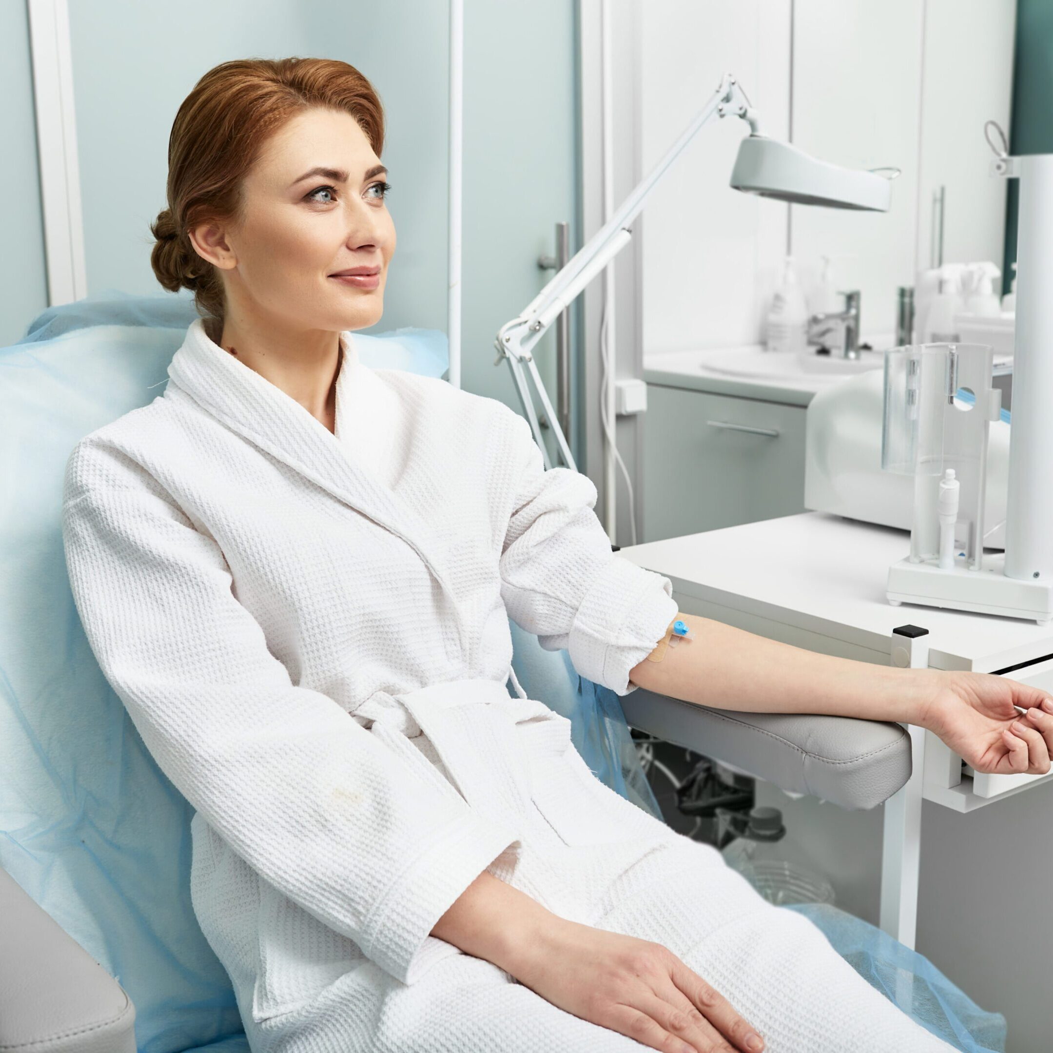 Ozone blood therapy. Adult woman before intravenous ozone therapy at a medical clinic